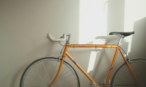 a bicycle parked in a room