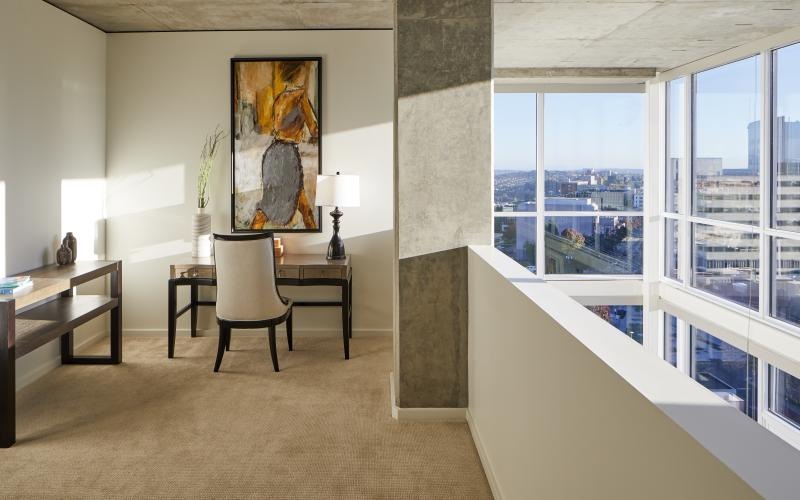 a room with a table and chairs