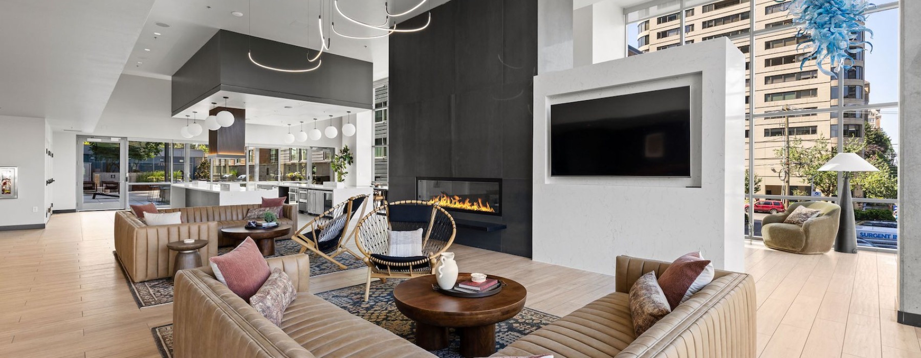 a sofa around a large fireplace