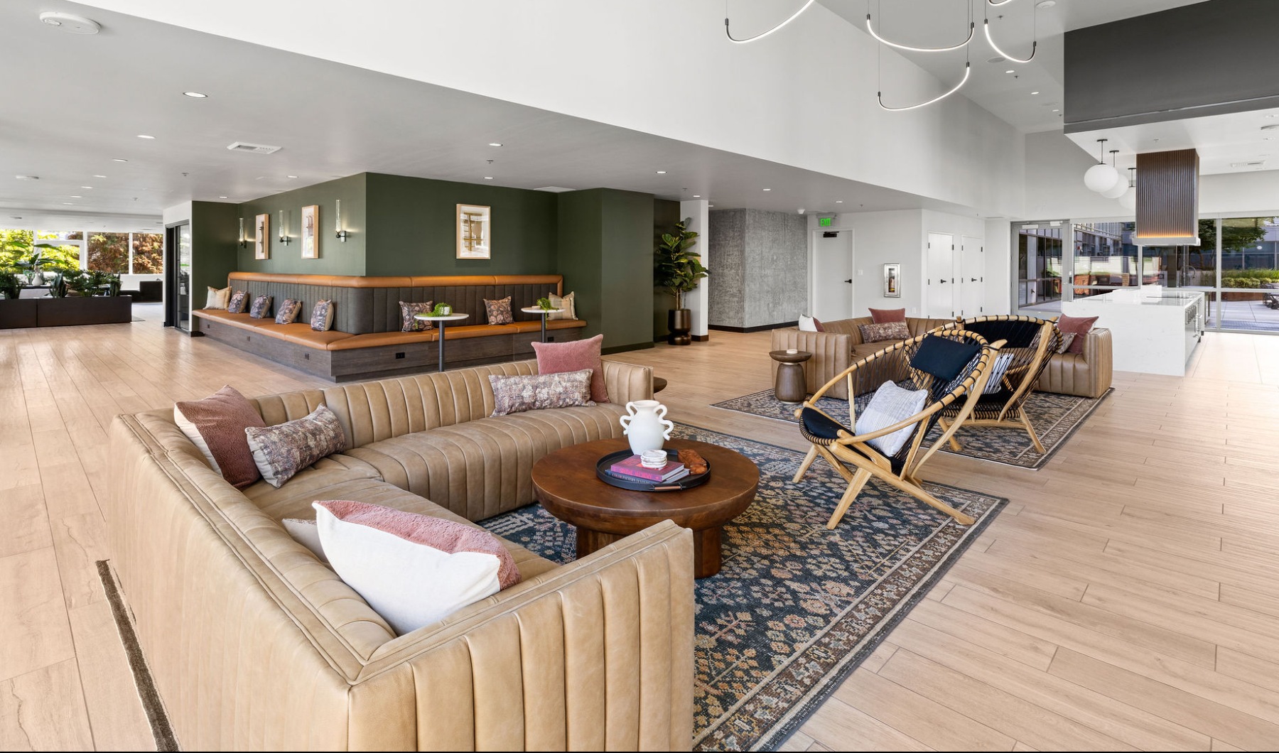 Resident lounge with couches, TV, and fireplace