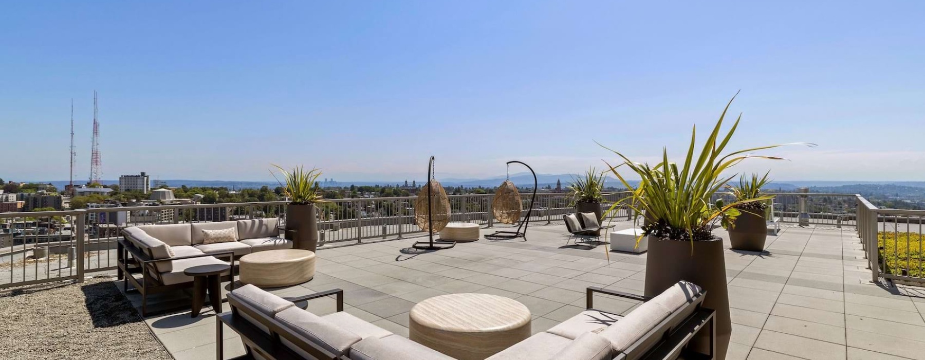 a rooftop lounge area over-looking a horizon