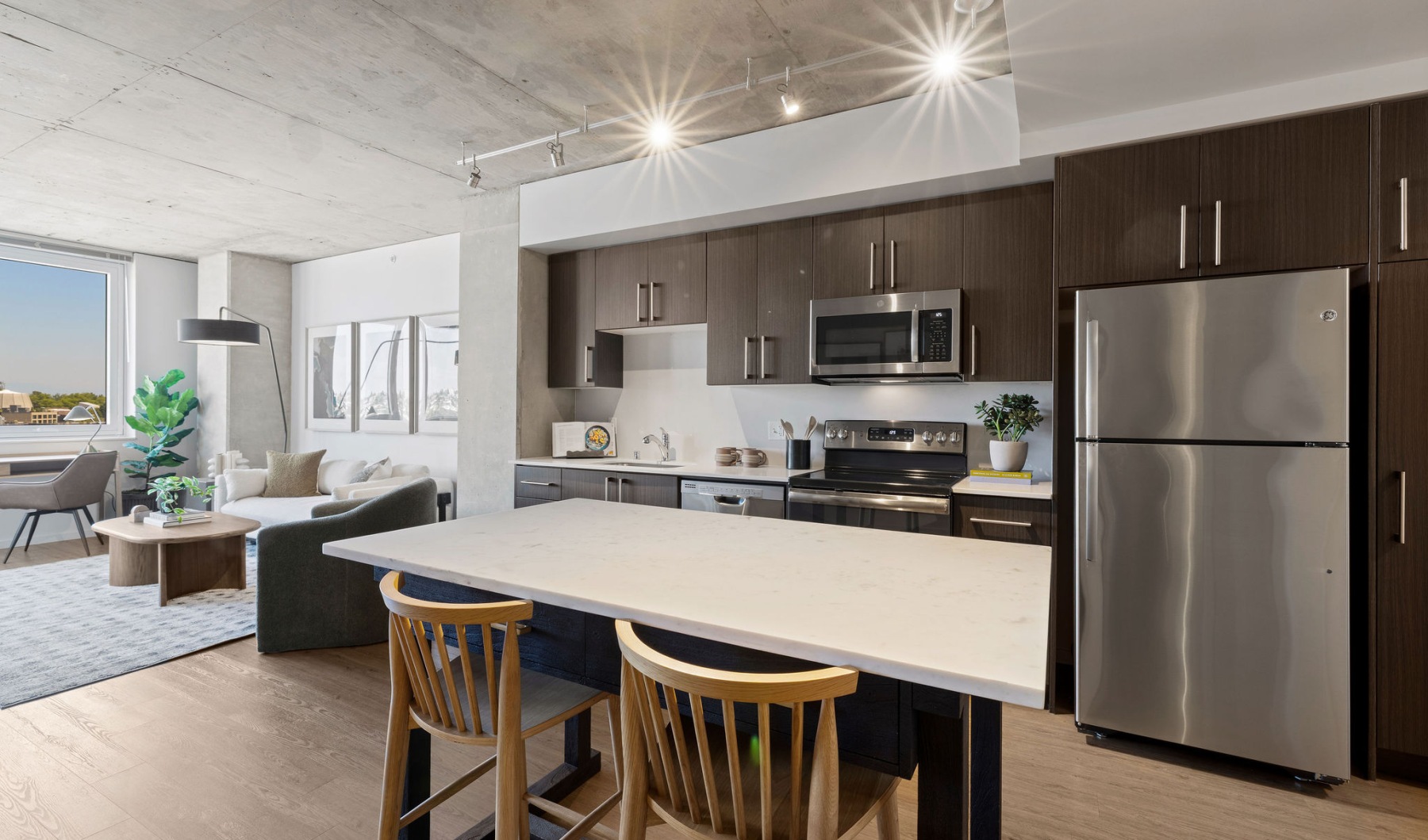 Modern kitchen with moveable island and stools