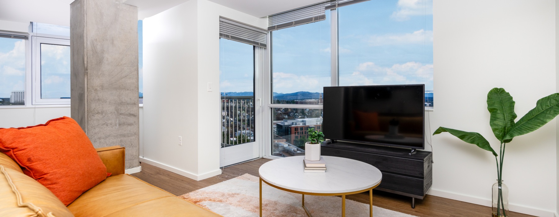 Modern bedroom in an MFTE, affordable apartment at The Danforth Apartments in Seattle