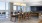 a dining room with a large table and chairs