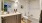 a bathroom with a tub toilet and sink