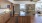 a kitchen with wooden cabinets