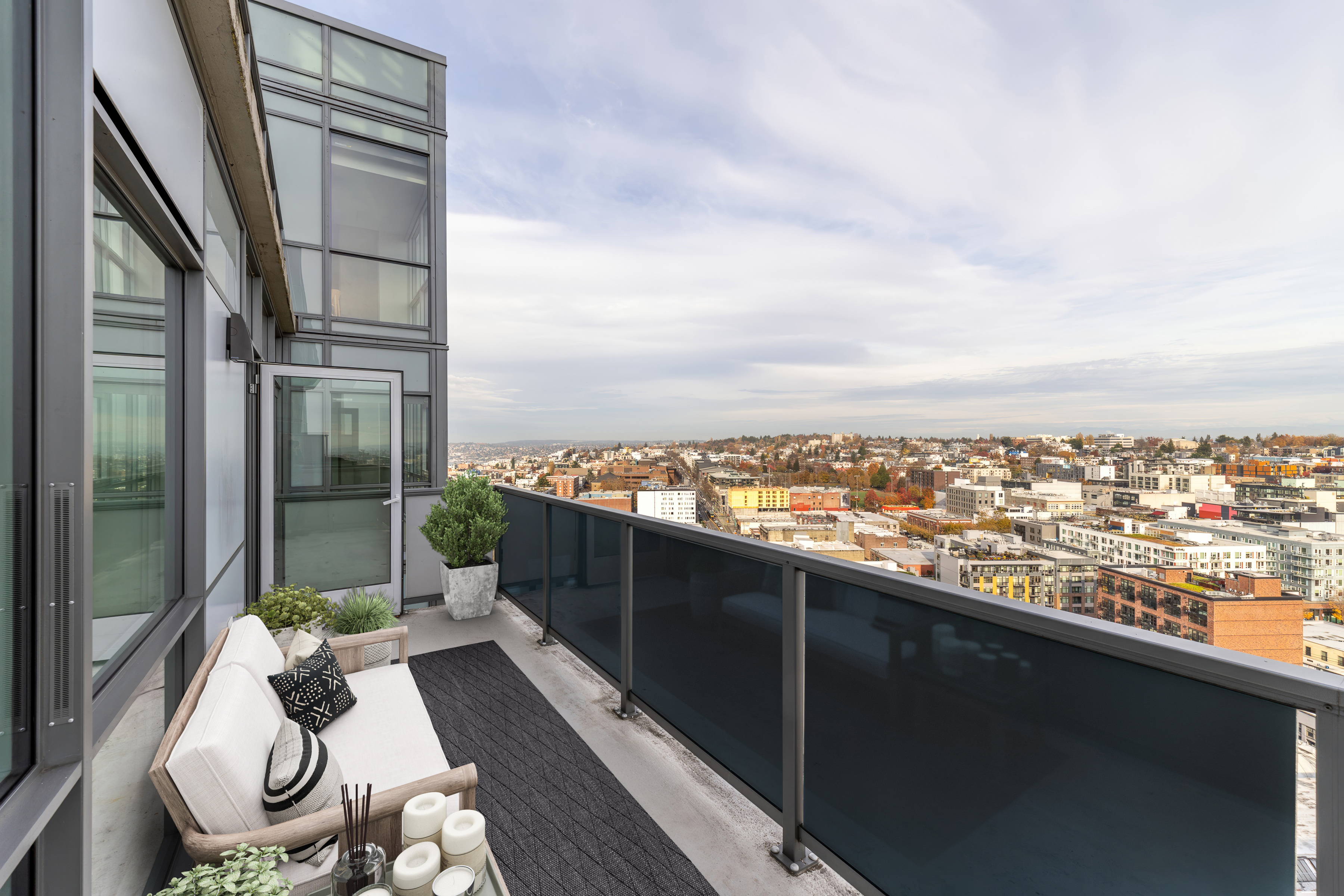 Relax and recharge at The Danforth balcony with chair